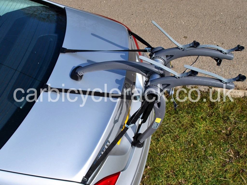 silver mercedes c class coupe with a bike rack fitted 