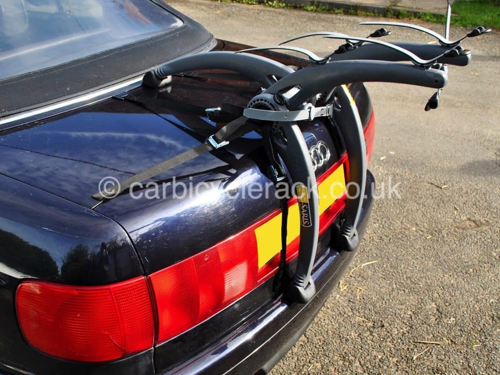 dark blue audi a4 cabriolet with a bike rack fitted photographed from the side