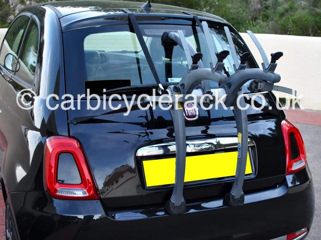 black fiat 500 with a bike rack fitted 